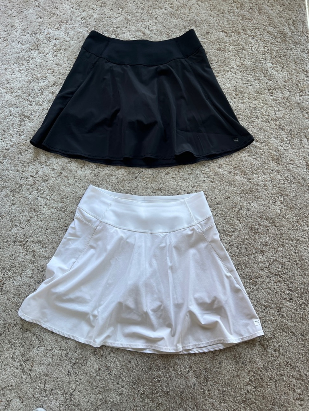 2 Puma PWRSHAPE Women’s Golf Skirts - Black and White Size Medium